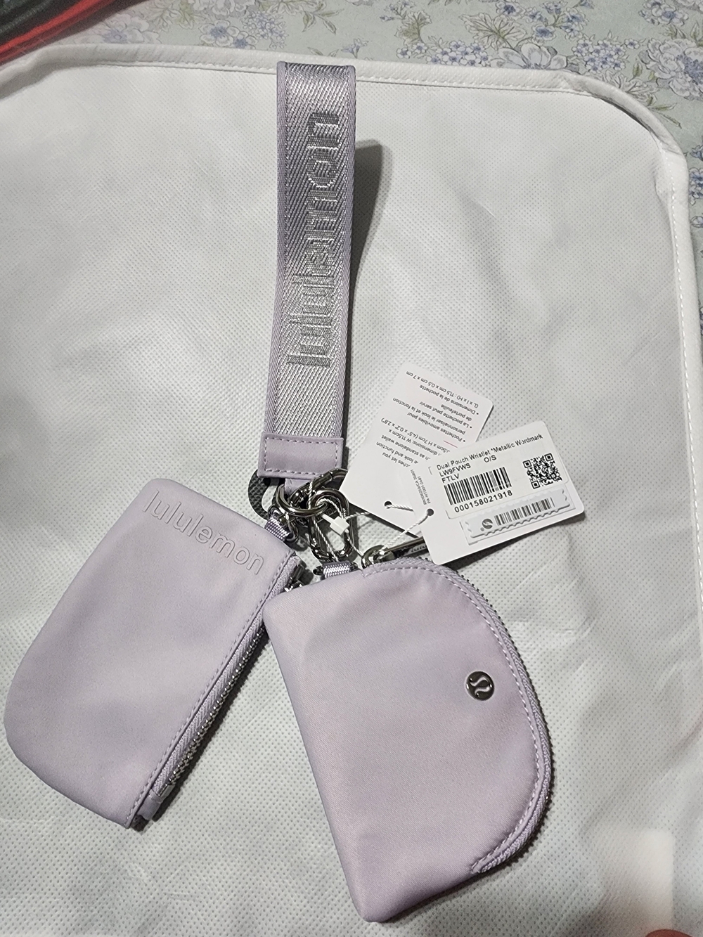lululemon athletica lilac wristlet pouch duo with branded strap